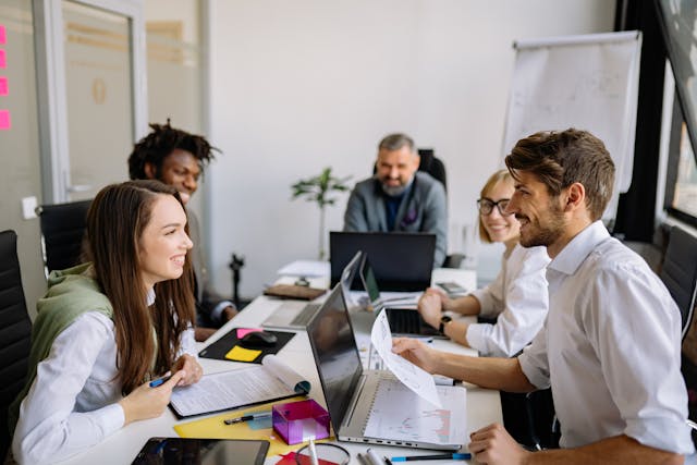 A group of people in a meeting