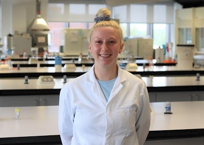 Student Hannah Parkin photographed in a laboratory