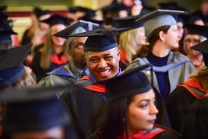 A group of students dressed for graduation