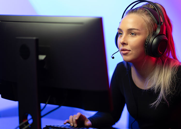 female student at a desktop computer