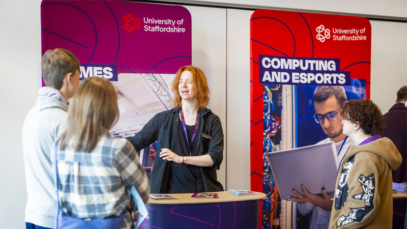 Open day visitors are talking at the course fair